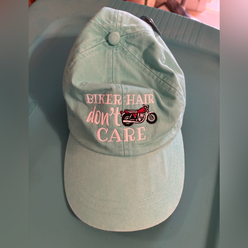 New w/tags. Customized Biker Hair Don’t Care ball cap.